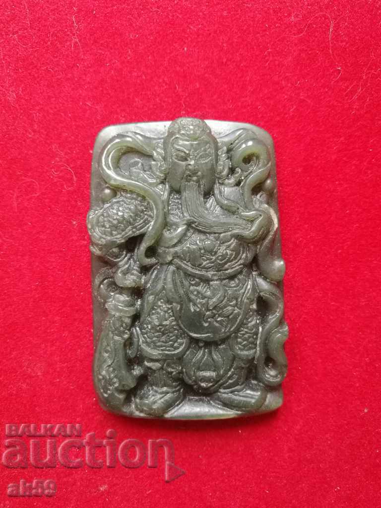 Jade amulet.