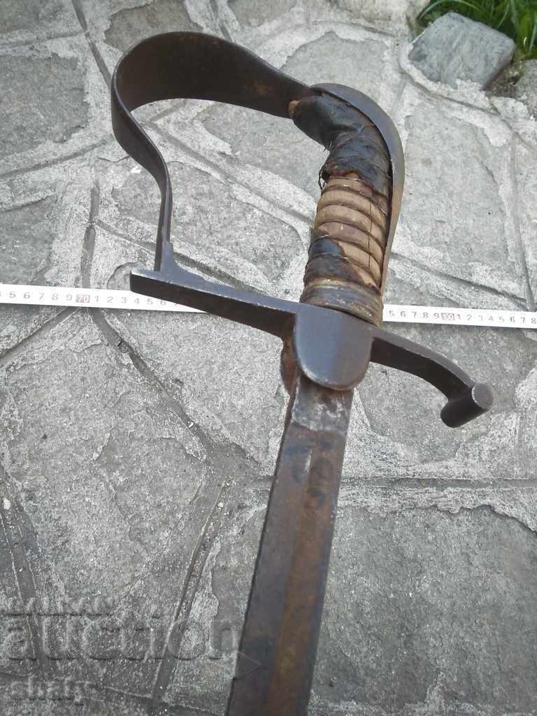 An old sword with price 520.00 BGN | € 265.87 An old sword with price 520.00 BGN | € 265.87