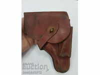 An old Bulgarian royal leather holster for a gun.