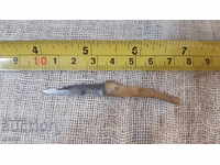 Miniature leg made of steel, bone, and brass inlays