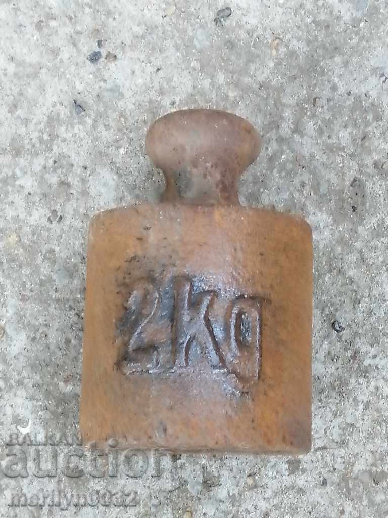 Delivery of Old weighing scale, exaggeration, kilogram control weight