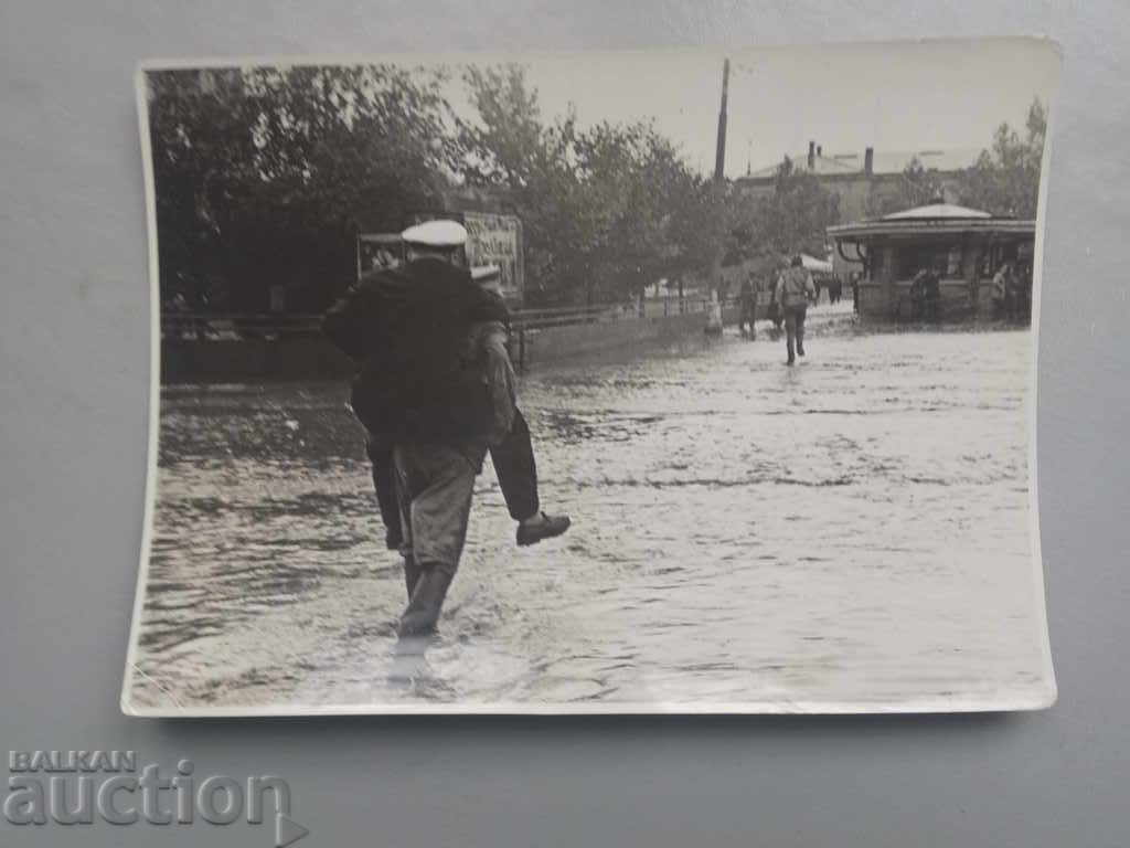Saving a civilian...flood Saving a civilian...flood