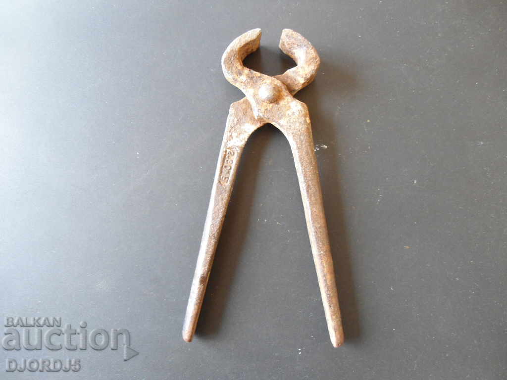 Old pliers, marking with price 2.00 BGN | € 1.02 Old pliers, marking with price 2.00 BGN | € 1.02