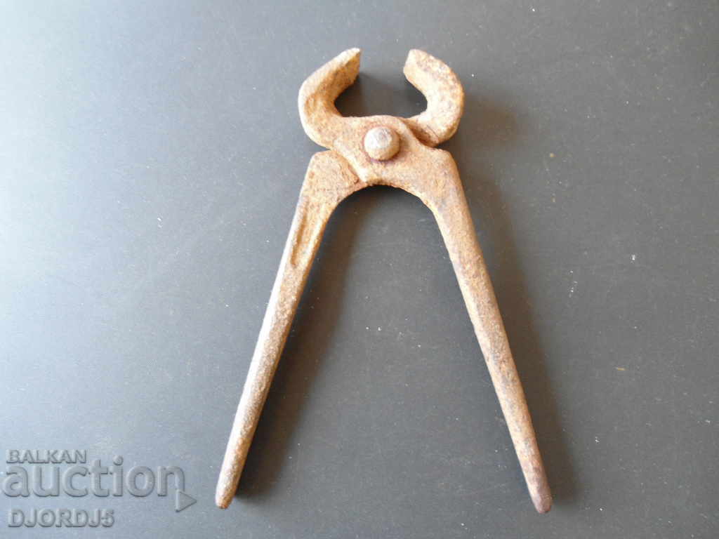 Old pliers, marking with price 2.00 BGN | € 1.02 Old pliers, marking with price 2.00 BGN | € 1.02