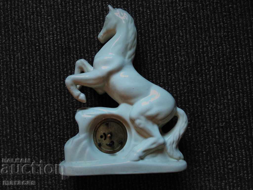 Porcelain figure with built-in clock with price 89.00 BGN | € 45.50