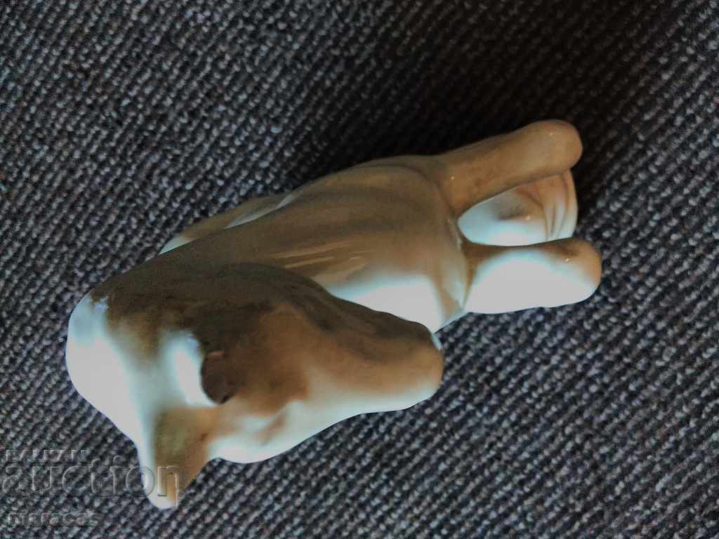 Auction  Porcelain figure with built-in clock