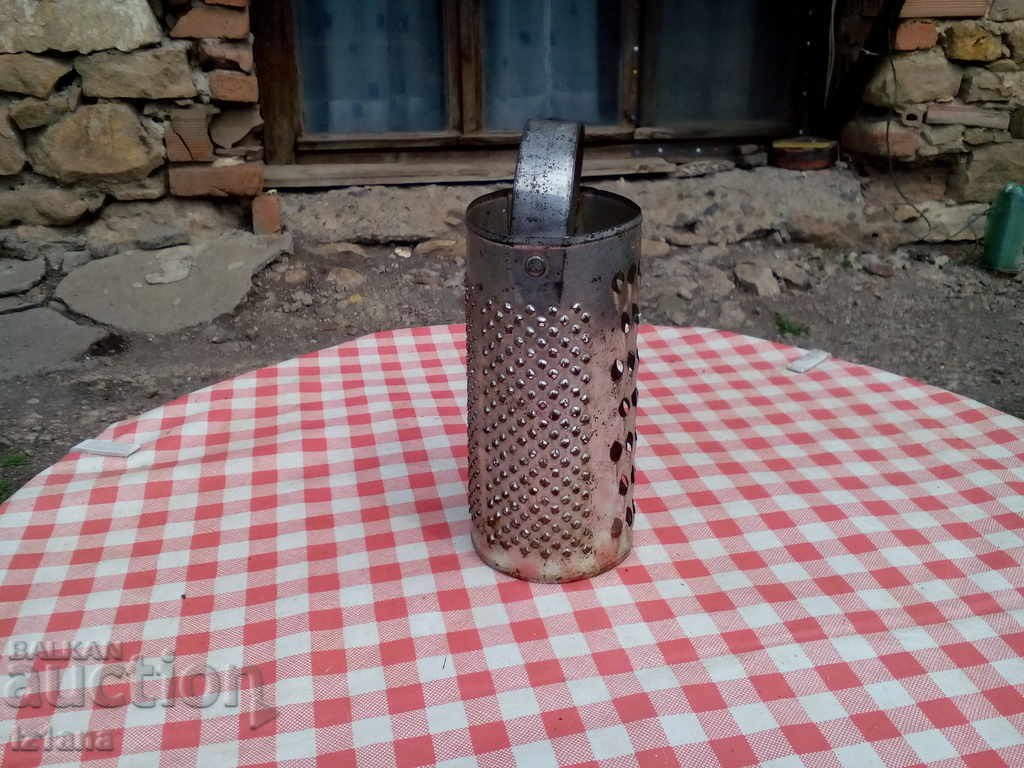 An old kitchen grater with price 8.00 BGN | € 4.09 An old kitchen grater with price 8.00 BGN | € 4.09