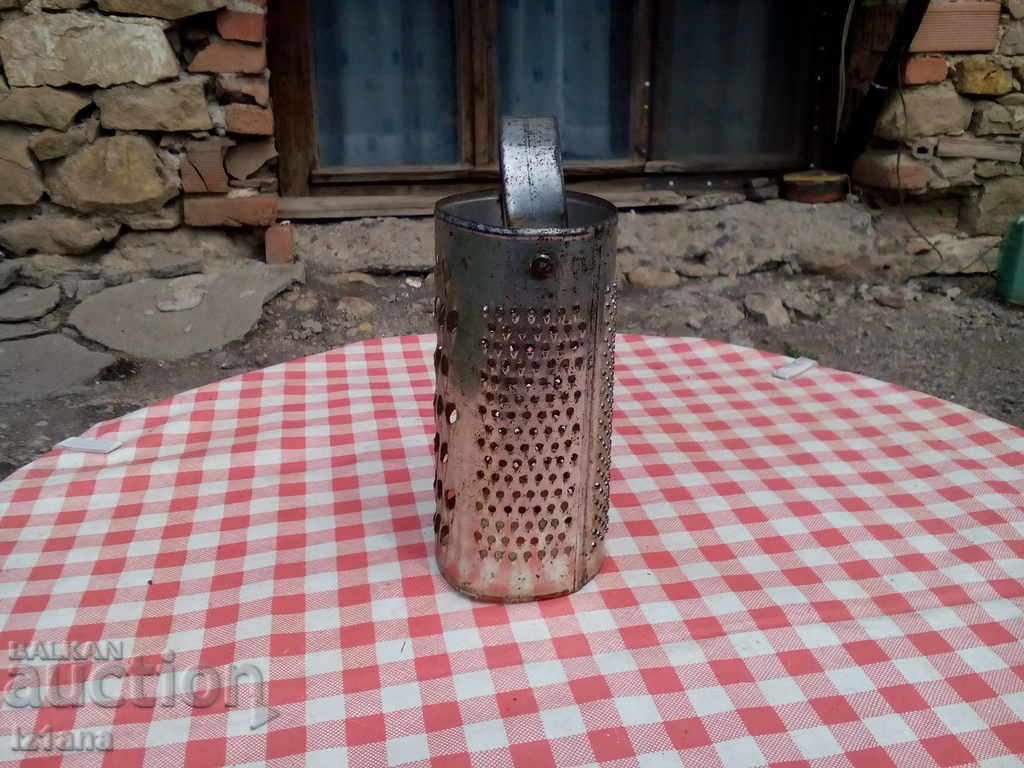 Delivery of An old kitchen grater Delivery of An old kitchen grater