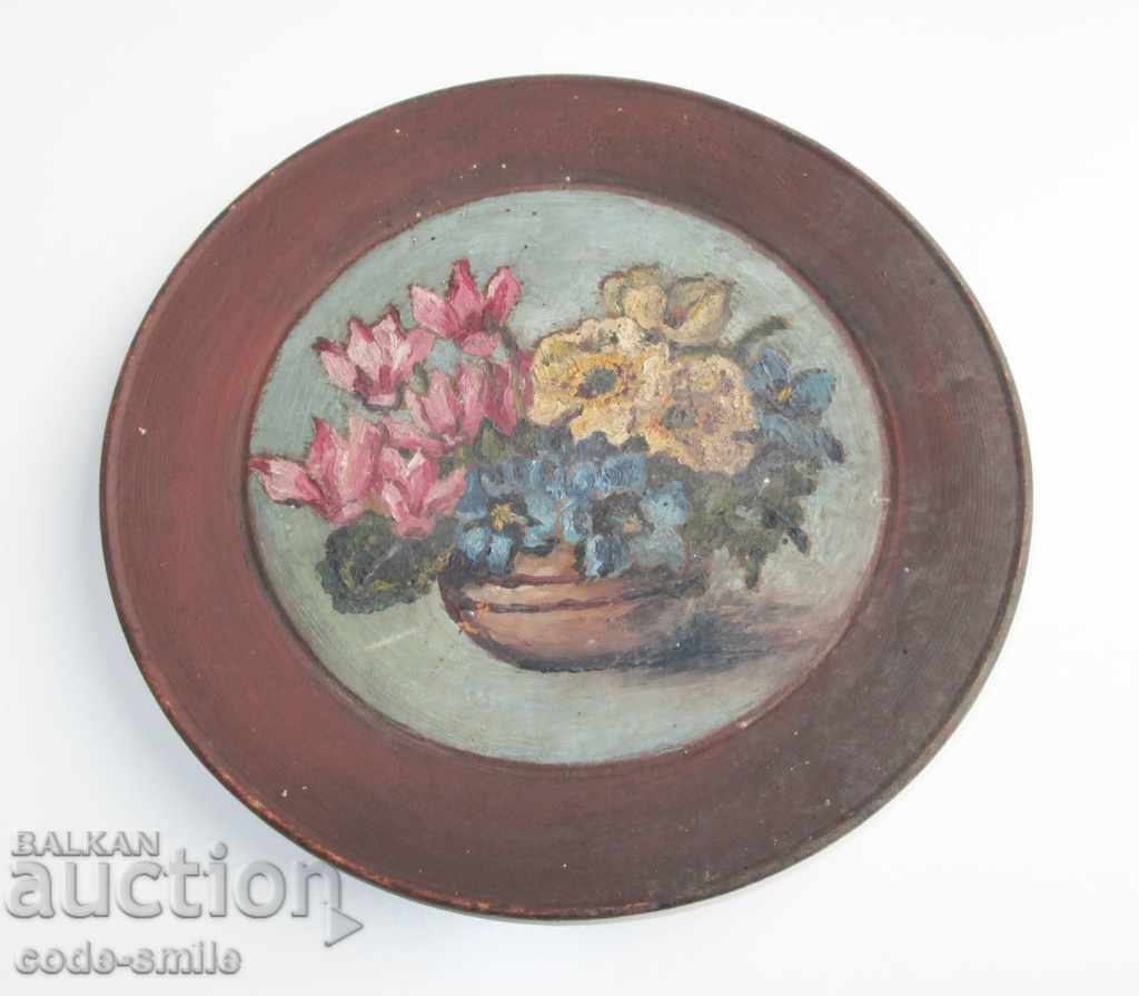 Παλιά εικόνα που σχεδιάζει λάδι λουλουδιών σε ξύλινο πιάτο
