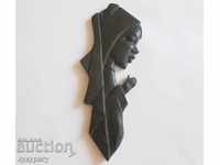 An old wooden religious figure panel carving ebony
