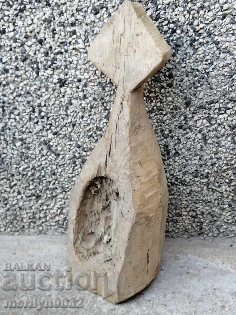 An old wooden object made of wood