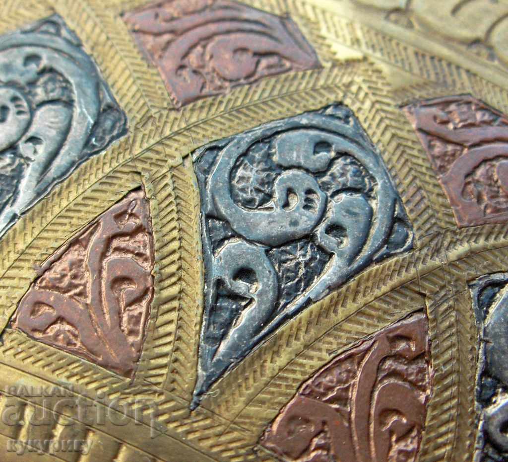 Delivery of An old forged copper and silver large plate for an elephant wall