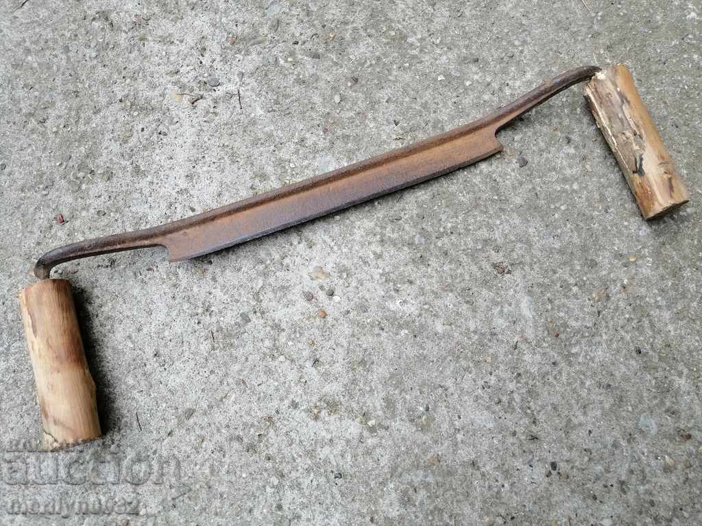 Auction  An old carpenter's hand, a tool, a saw, wrought iron