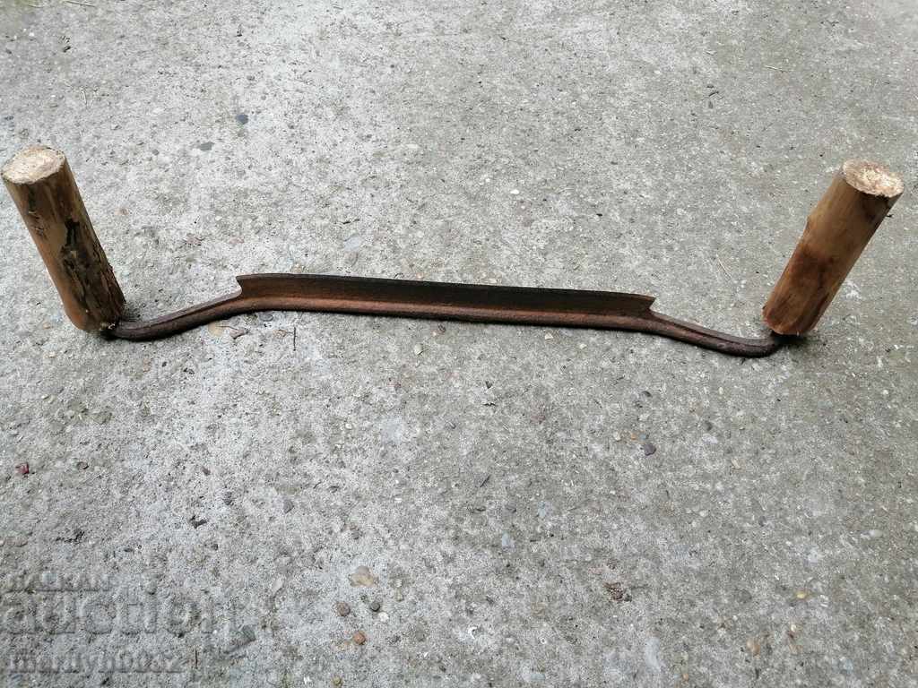 Delivery of An old carpenter's hand, a tool, a saw, wrought iron