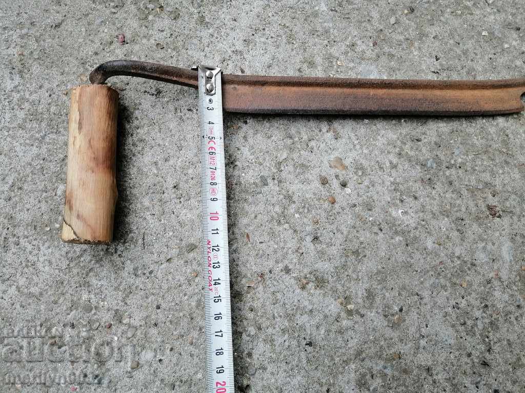 An old carpenter's hand, a tool, a saw, wrought iron - 5