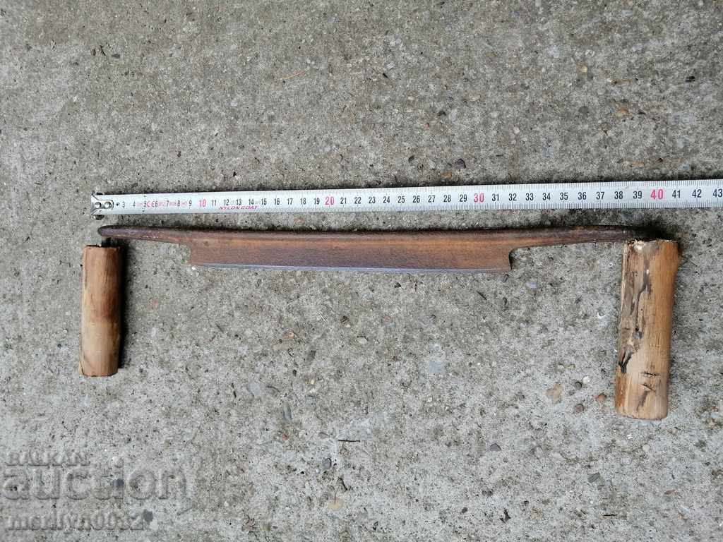 An old carpenter's hand, a tool, a saw, wrought iron - 6