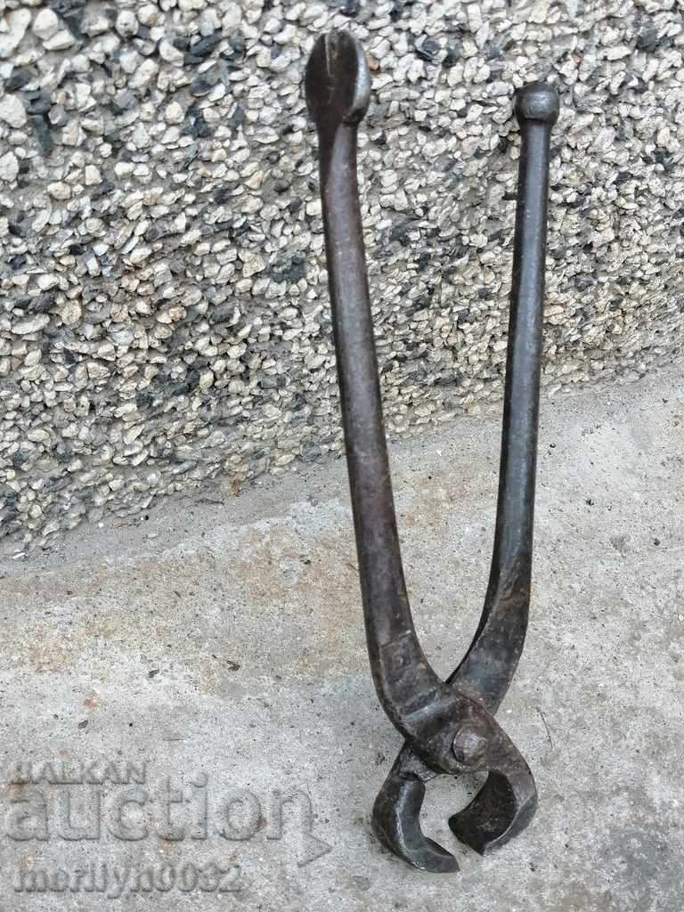Auction Old tongs, wrought iron, tool corpen Auction Old tongs, wrought iron, tool corpen