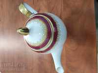 Porcelain jug 23 cm high with gold applique