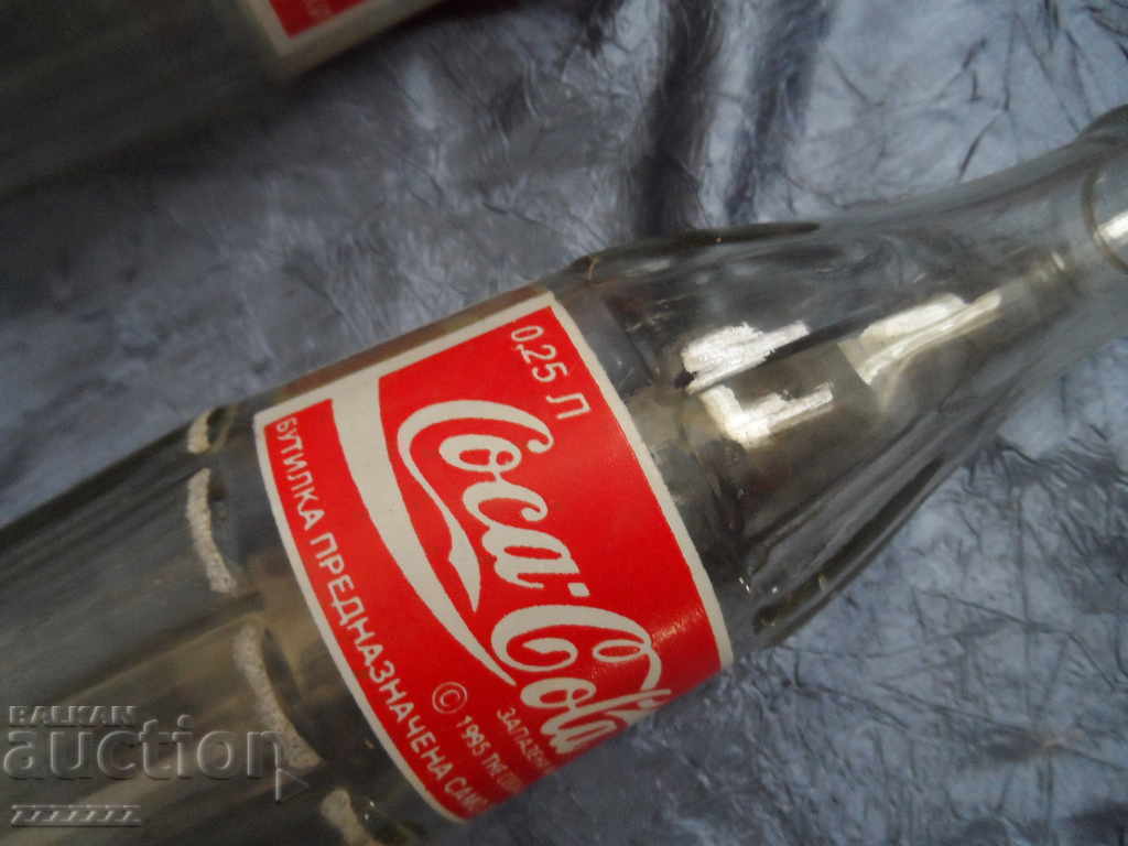 Delivery of 2 Coca Cola bottles Delivery of 2 Coca Cola bottles