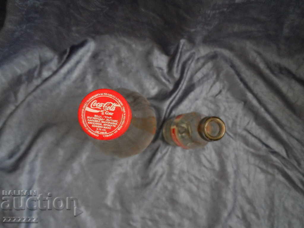 2 Coca Cola bottles - 5 2 Coca Cola bottles - 5