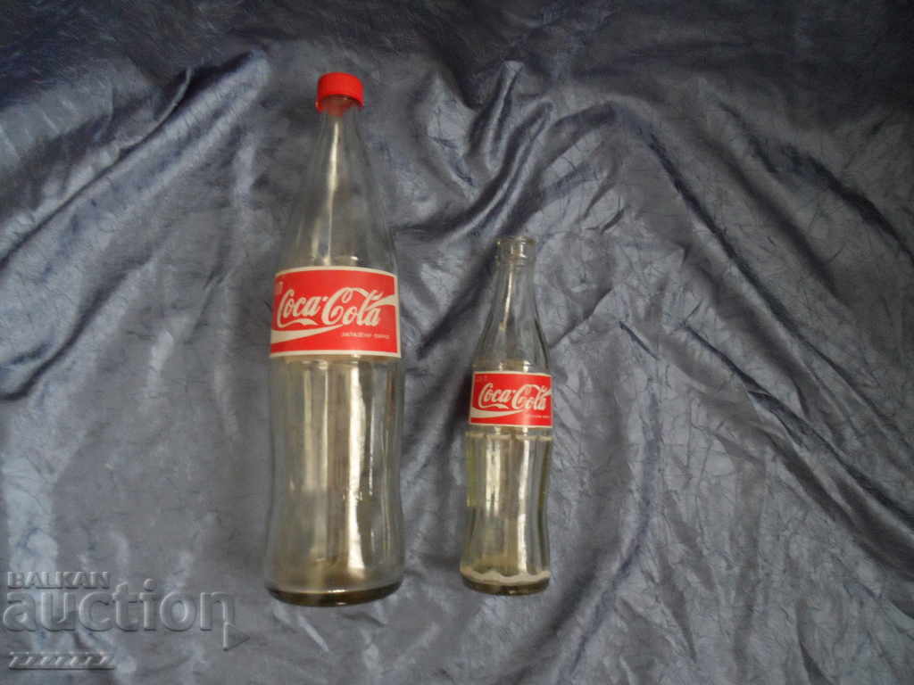 2 Coca Cola bottles 2 Coca Cola bottles