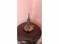 Old candlestick with cap
