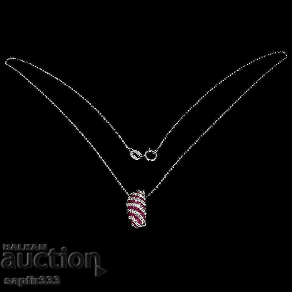 Auction DESIGNER MEDALLION WITH NATURAL RUBINES AND TOPAS Auction DESIGNER MEDALLION WITH NATURAL RUBINES AND TOPAS