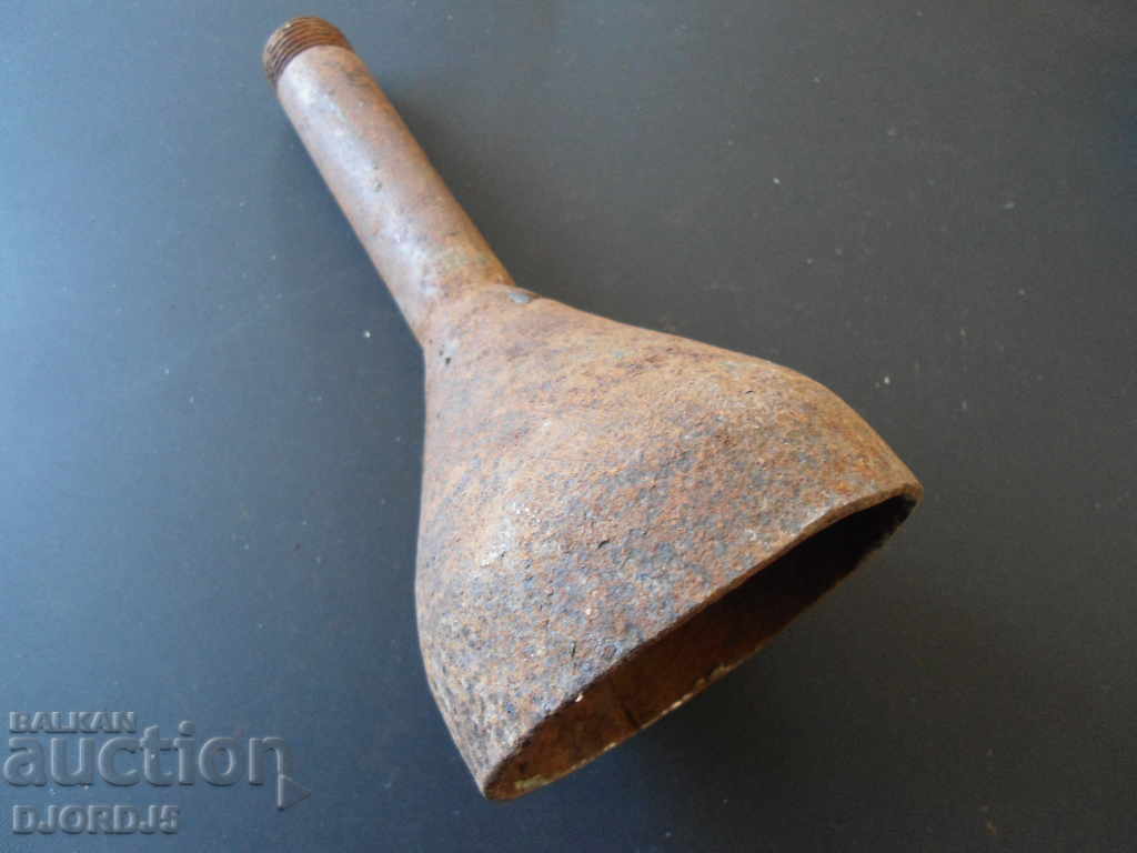 Old metal funnel with strainer