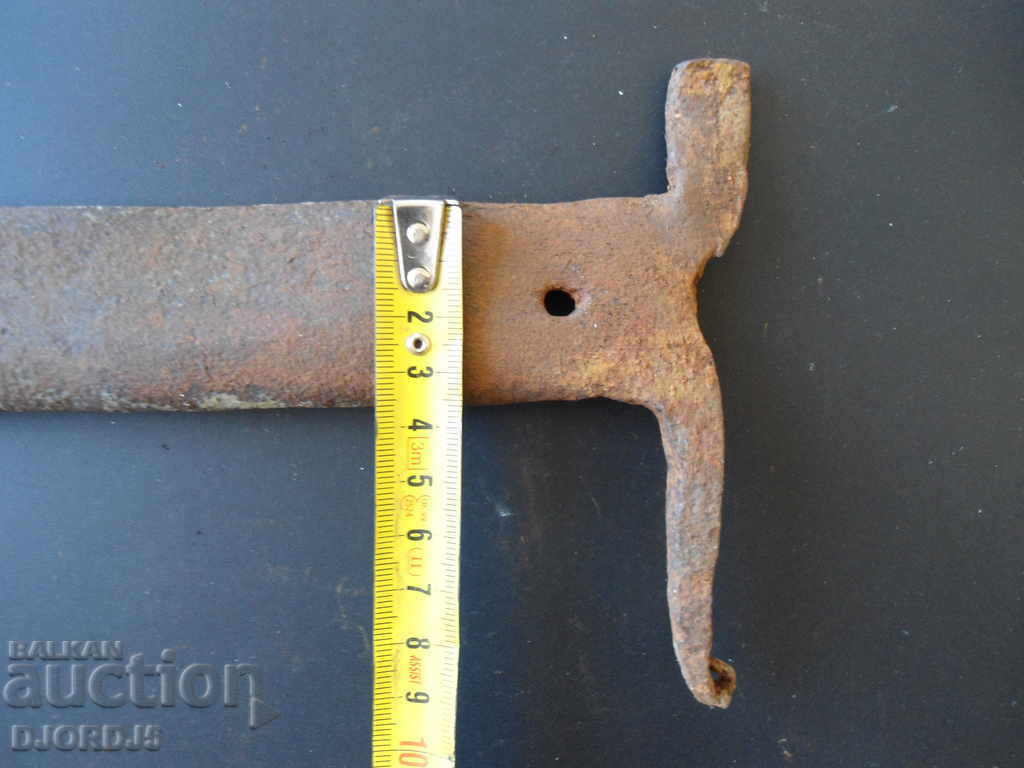 Auction  An old forged scraper