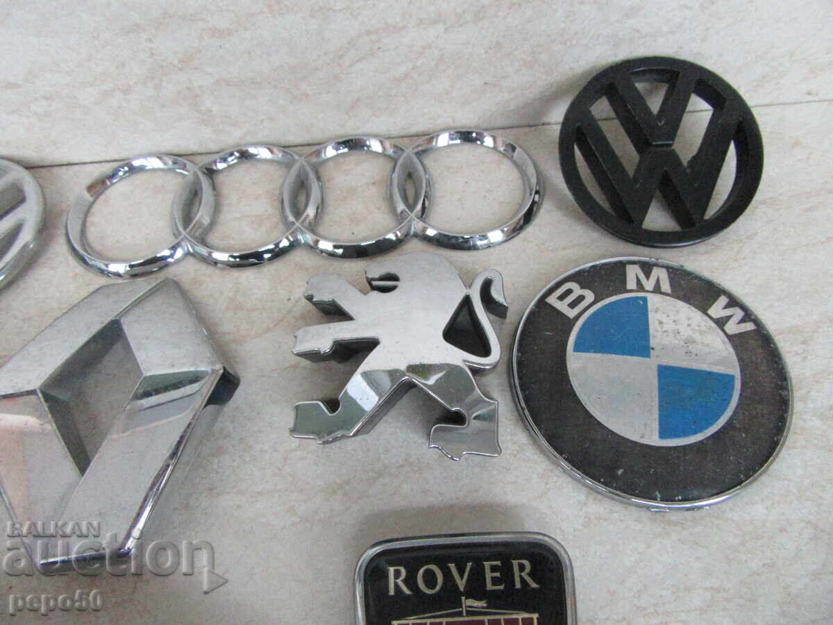Auction 9 pcs. EMBLEMS OF WESTERN CARS Auction 9 pcs. EMBLEMS OF WESTERN CARS
