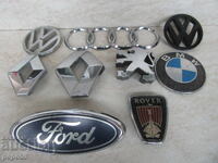 9 pcs. EMBLEMS OF WESTERN CARS