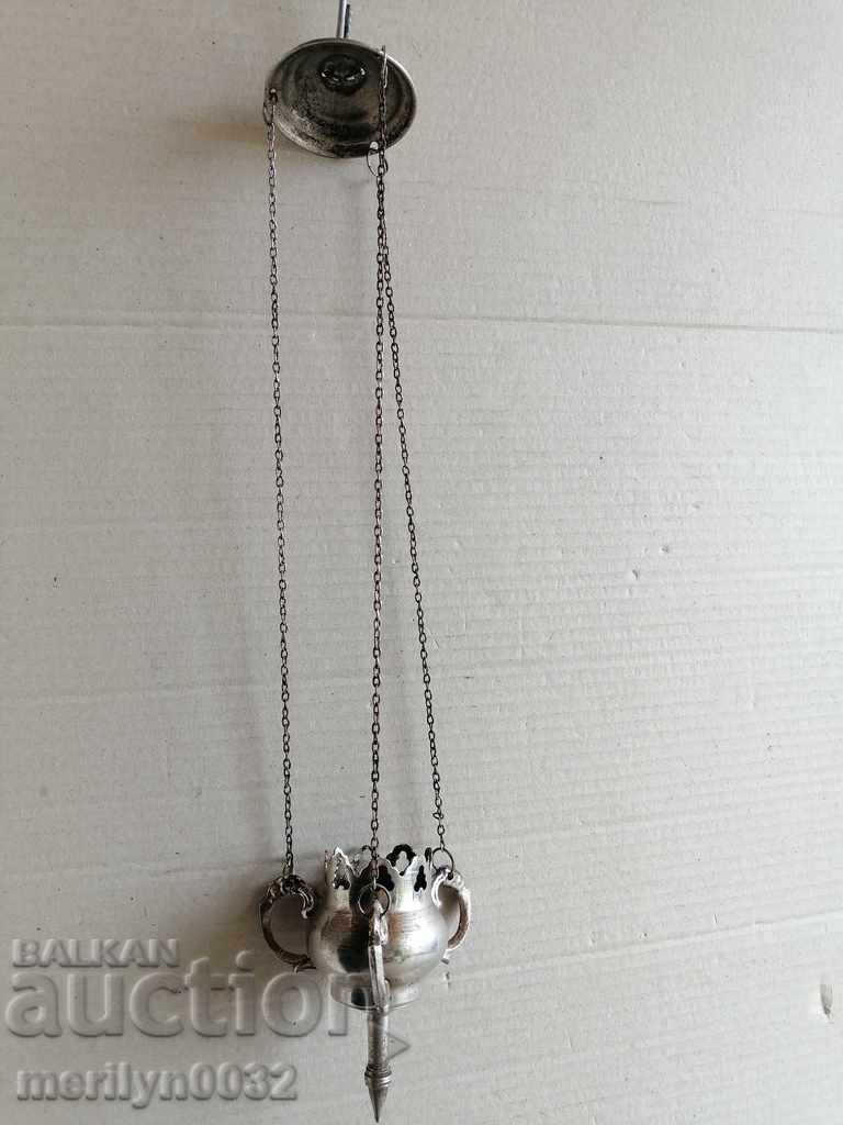 Old bronze oil lamp without a cup, icon, religion, cross Jesus Old bronze oil lamp without a cup, icon, religion, cross Jesus