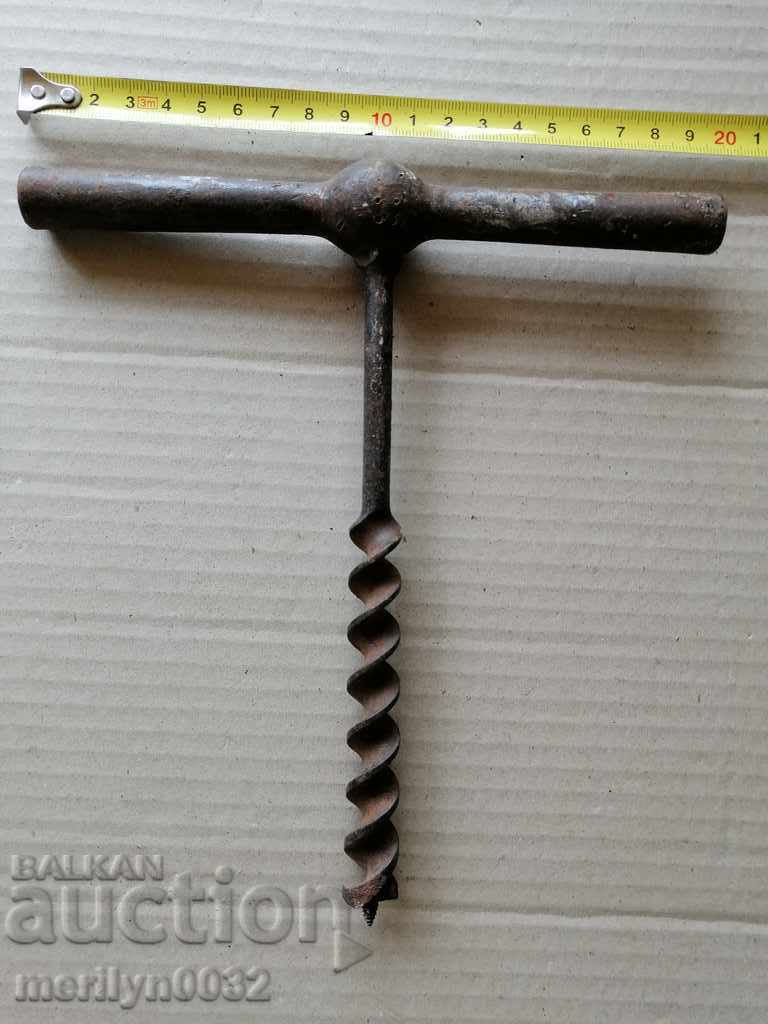 Auction An old primitive crunch, a drill, a screwdriver Auction An old primitive crunch, a drill, a screwdriver