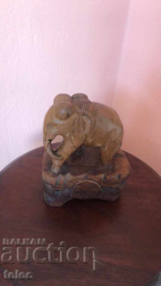 Delivery of Wooden elephant on a pedestal - reduced price