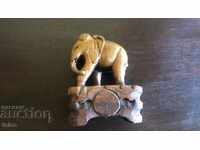 Wooden elephant on a pedestal - reduced price