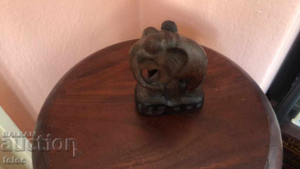 Wooden elephant on a pedestal with price € 8.00 | 15.65 BGN