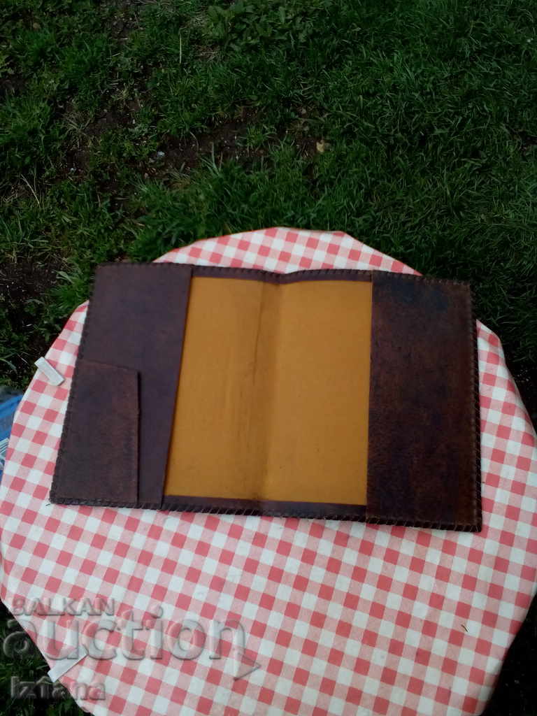 Auction An old leather folder Auction An old leather folder