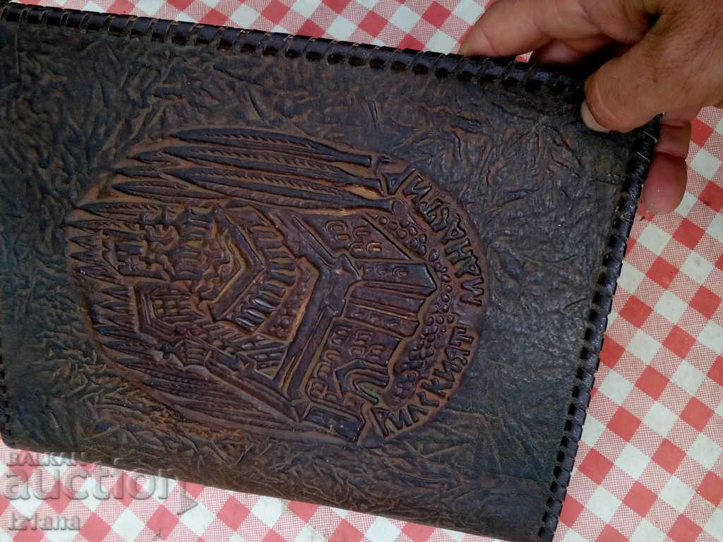 Delivery of An old leather folder Delivery of An old leather folder