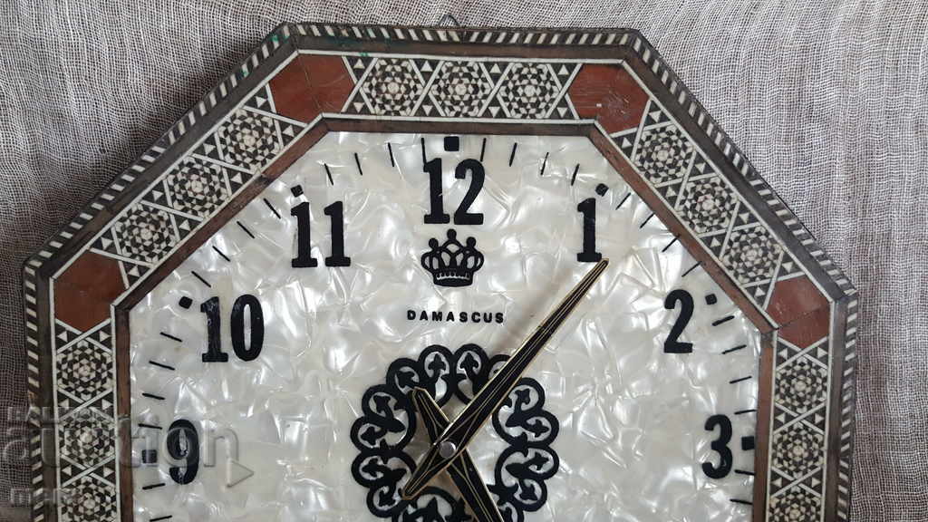 Auction Wall clock with mother of pearl and marquetry Auction Wall clock with mother of pearl and marquetry