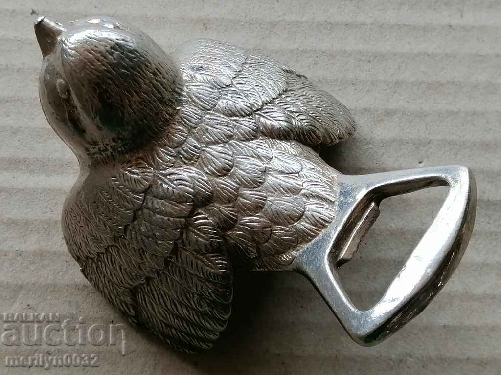 Delivery of German opener with a figure of a bird for beer 80s. Delivery of German opener with a figure of a bird for beer 80s.
