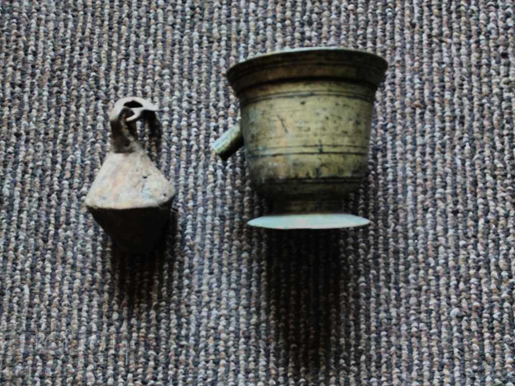 A brass mortar and pestle from an old scale A brass mortar and pestle from an old scale