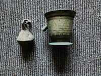 A brass mortar and pestle from an old scale