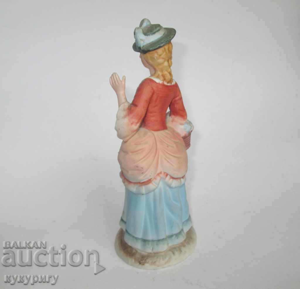 Auction Painted porcelain statuette figure of the Baroque Lady Auction Painted porcelain statuette figure of the Baroque Lady