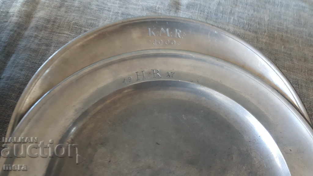 A set of metal plates from the beginning of the last century with price 55.00 BGN | € 28.12