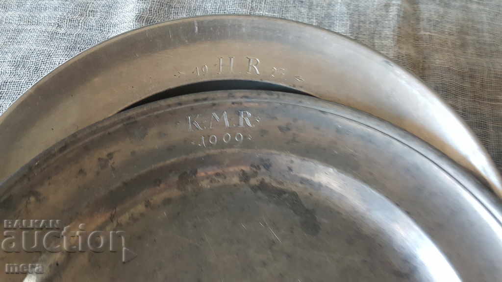 Auction  A set of metal plates from the beginning of the last century
