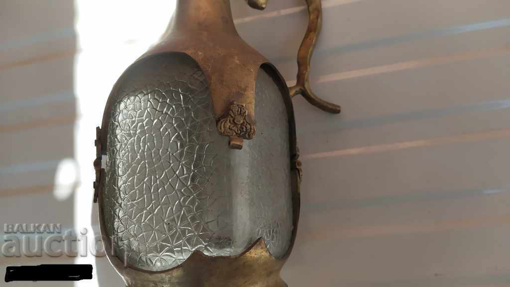 Auction Bottle of bronze and glass Auction Bottle of bronze and glass