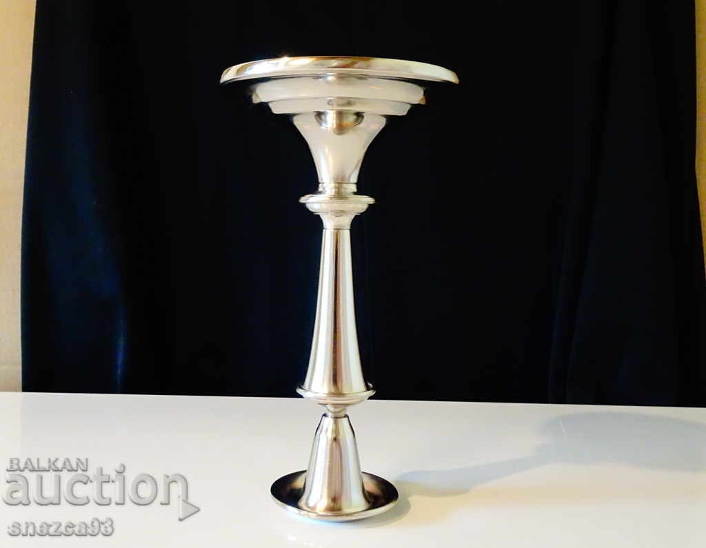 Auction German silver-plated candlestick 20 cm. Auction German silver-plated candlestick 20 cm.