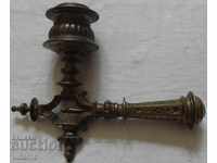 an old candleholder for a wall