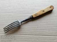 Old fork for cutting meat cutlery