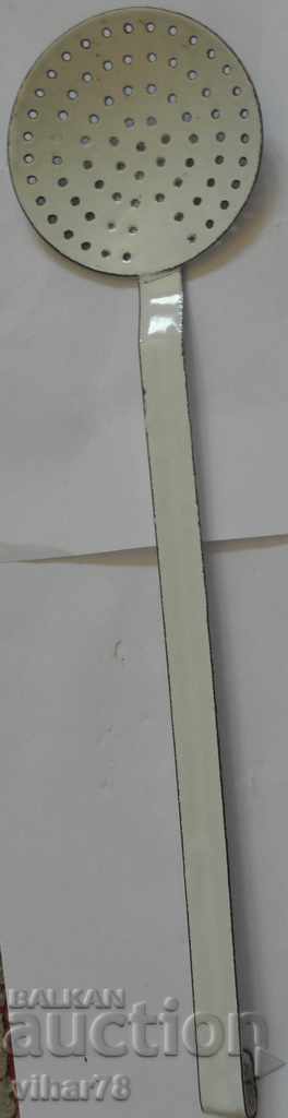 Delivery of An old enamel spoon